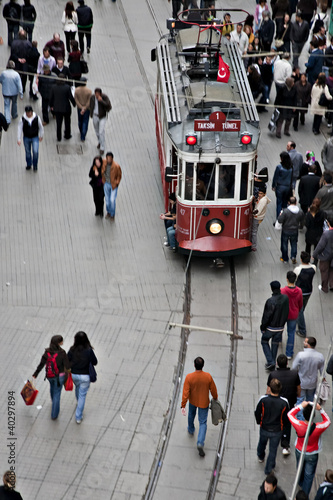 Photography Istanbul, Turkey - October 18, 2008: Tram and walking people, Is
