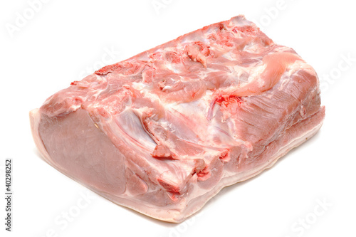 Piece of raw pork on white