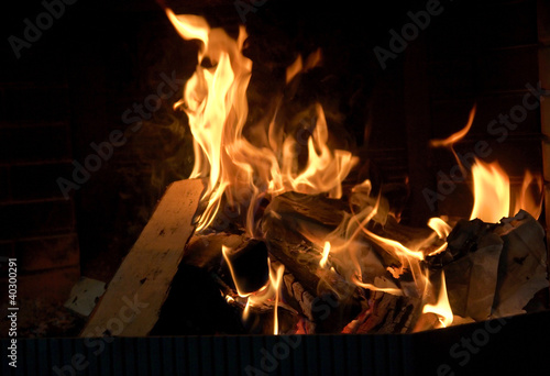 Burning logs in fireplace