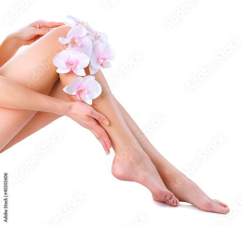 Healthy Legs. Spa. Long woman legs isolated on white