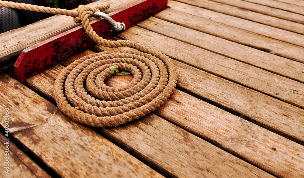 Marine rope spiral on wooden deck