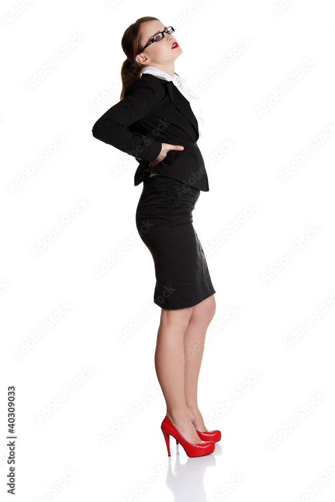 Business woman with backache Business woman with backache