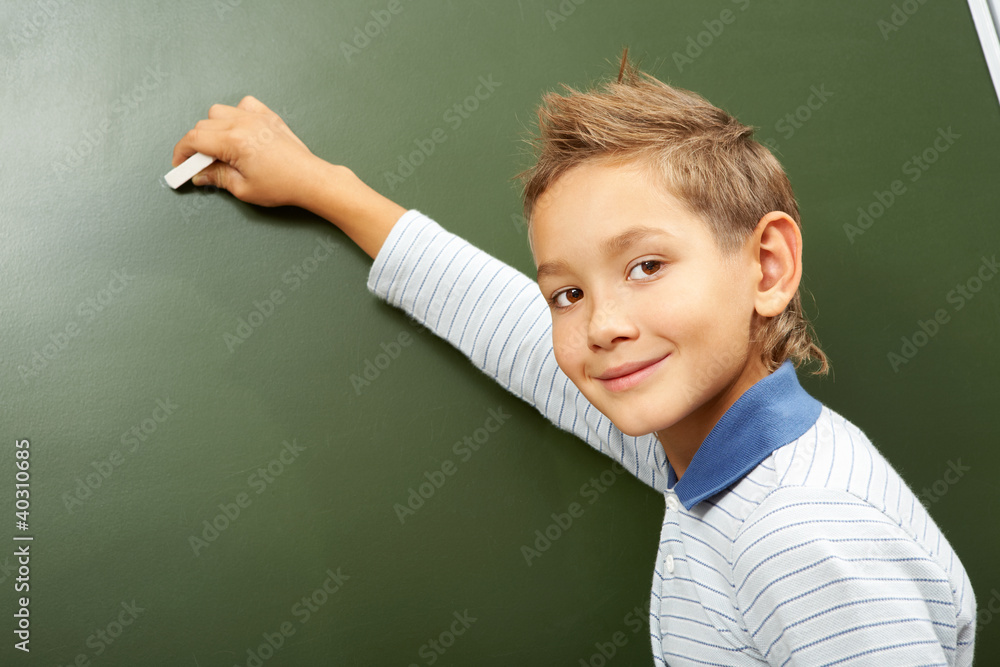 Boy at blackboard