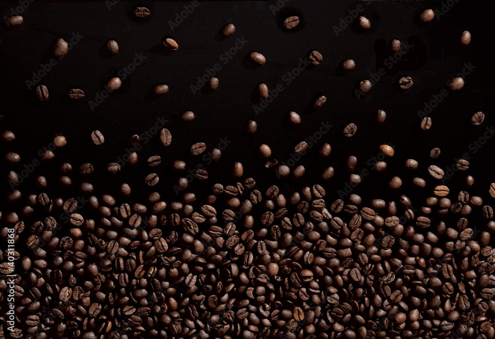 Coffee beans background isolated on black