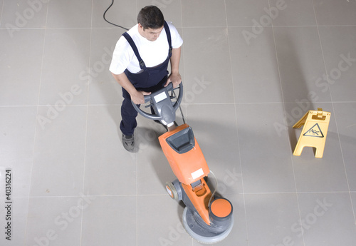 cleaning floor with machine