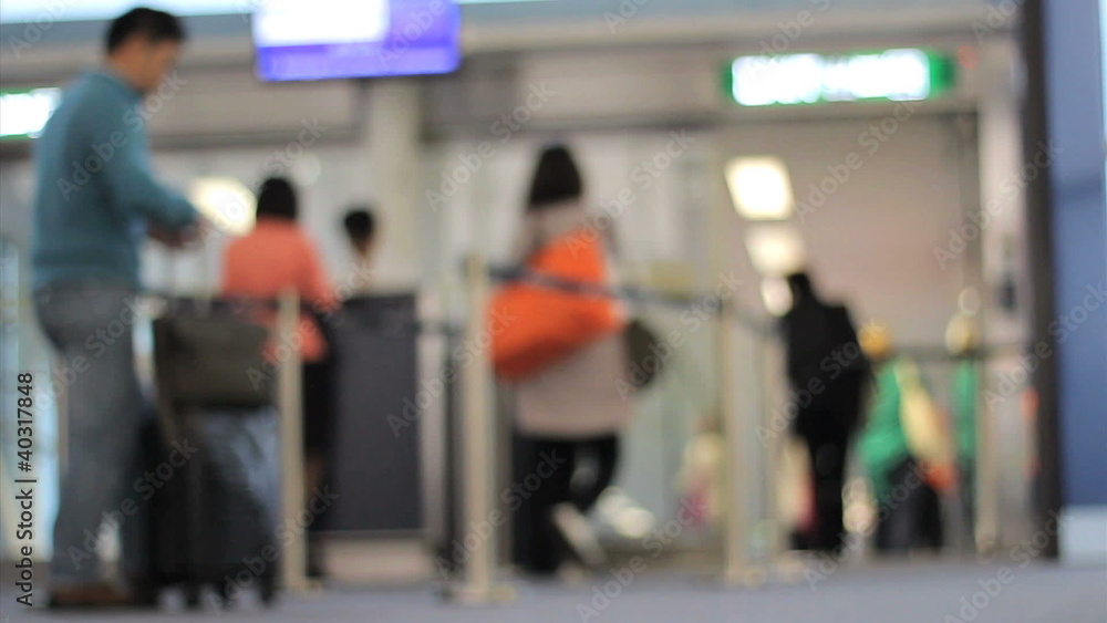 People Head Down Gangway To Board Airplane