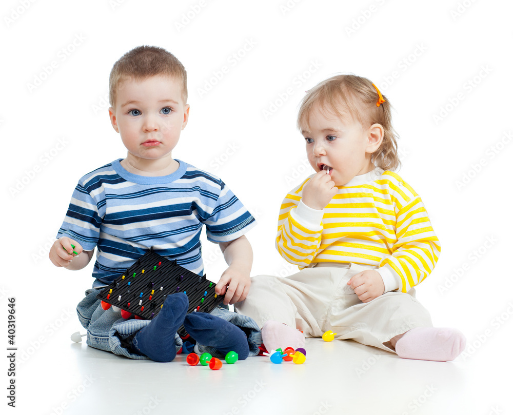 Children playing with mosaic toy. Concept for health hazard to Children playing with mosaic toy. Concept for health hazard to