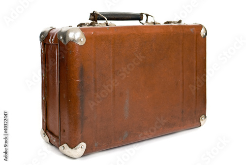 Old suitcase isolated on a white background
