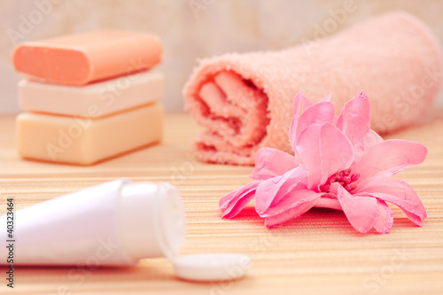 daily spa objects  towel  soaps  lotion  flower