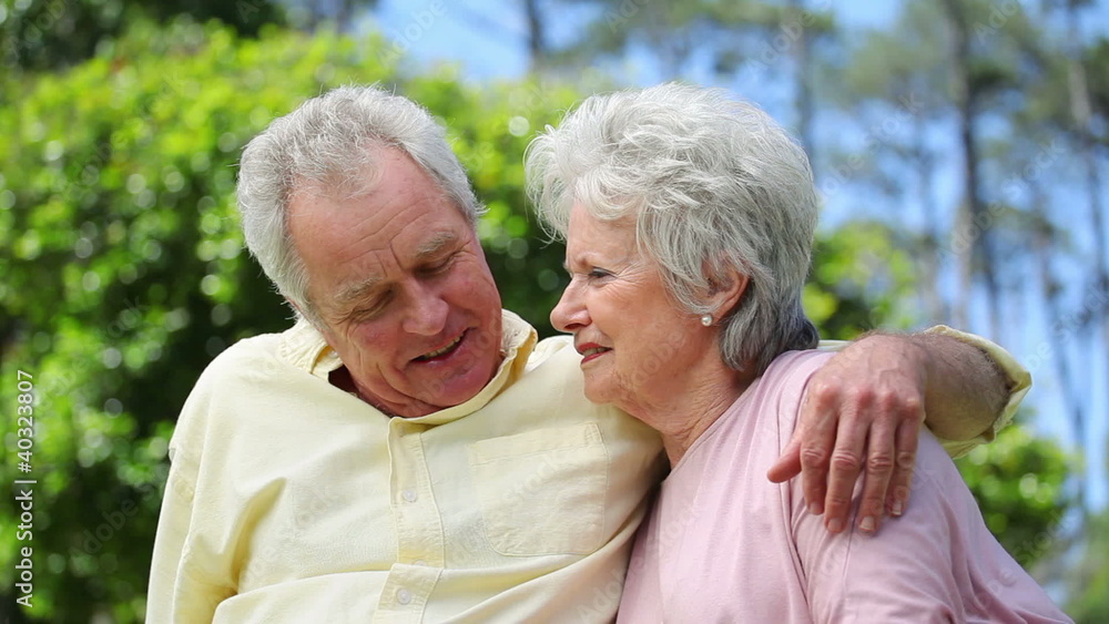 Retired couple embracing each other Retired couple embracing each other
