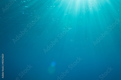 background with sunbeams underwater