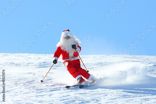 Father Christmas skiing
