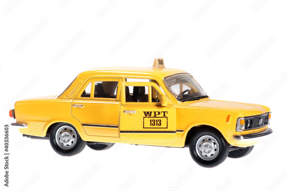 The yellow old taxi with the door open.