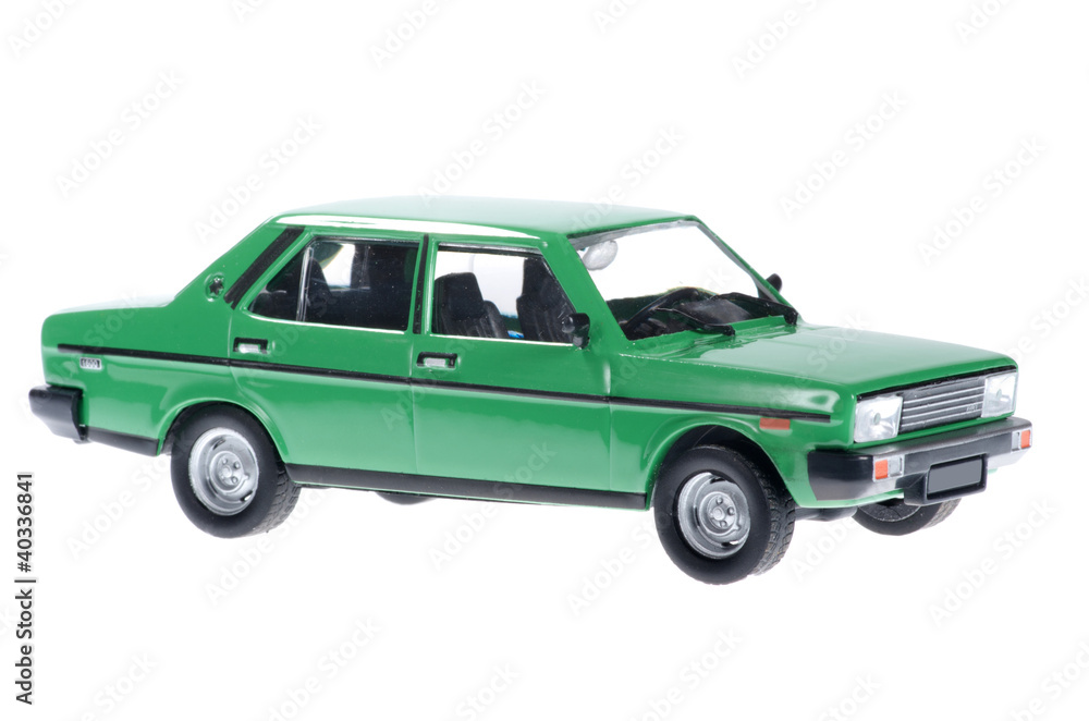 Green city car on white background.