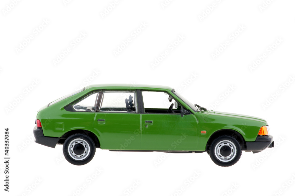 Green city car on white background.