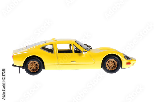 Yellow sport car on white background.