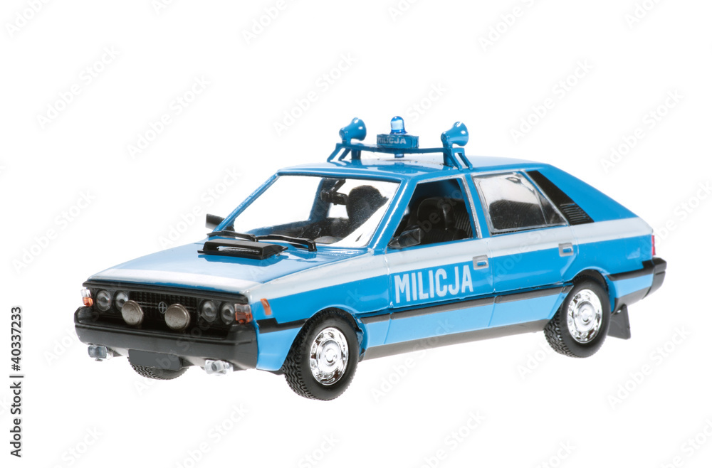 Old police car on white background.