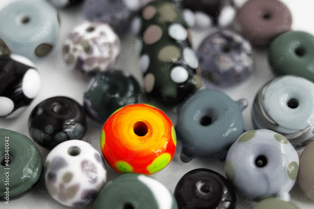 assortment of glass beads with one bright one assortment of glass beads with one bright one