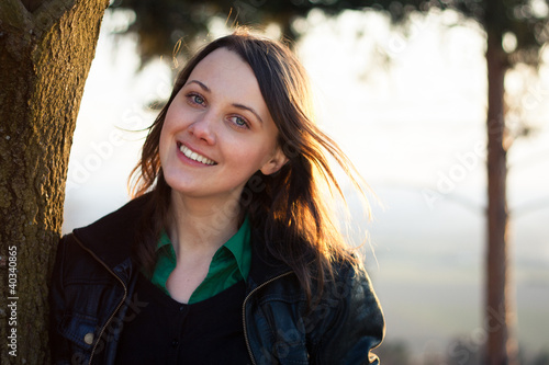 Portrait of a pretty young woman on a warm spring evening