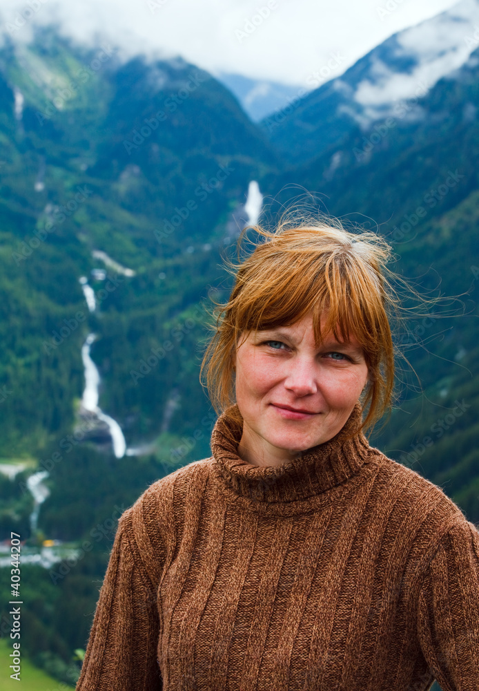 Alps summer mountain and woman portrait. Alps summer mountain and woman portrait.