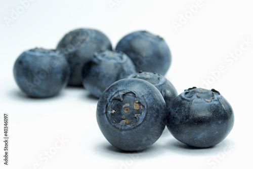 Selection of blueberries close up on a white background