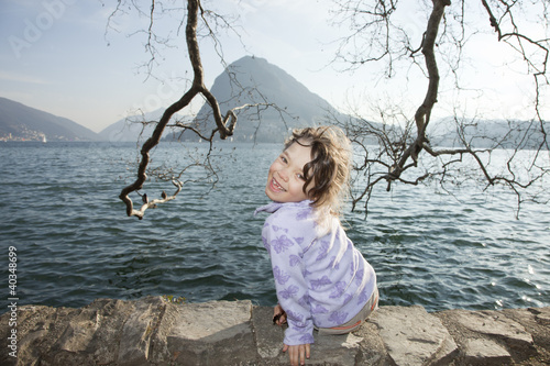 little girl by the lake photo