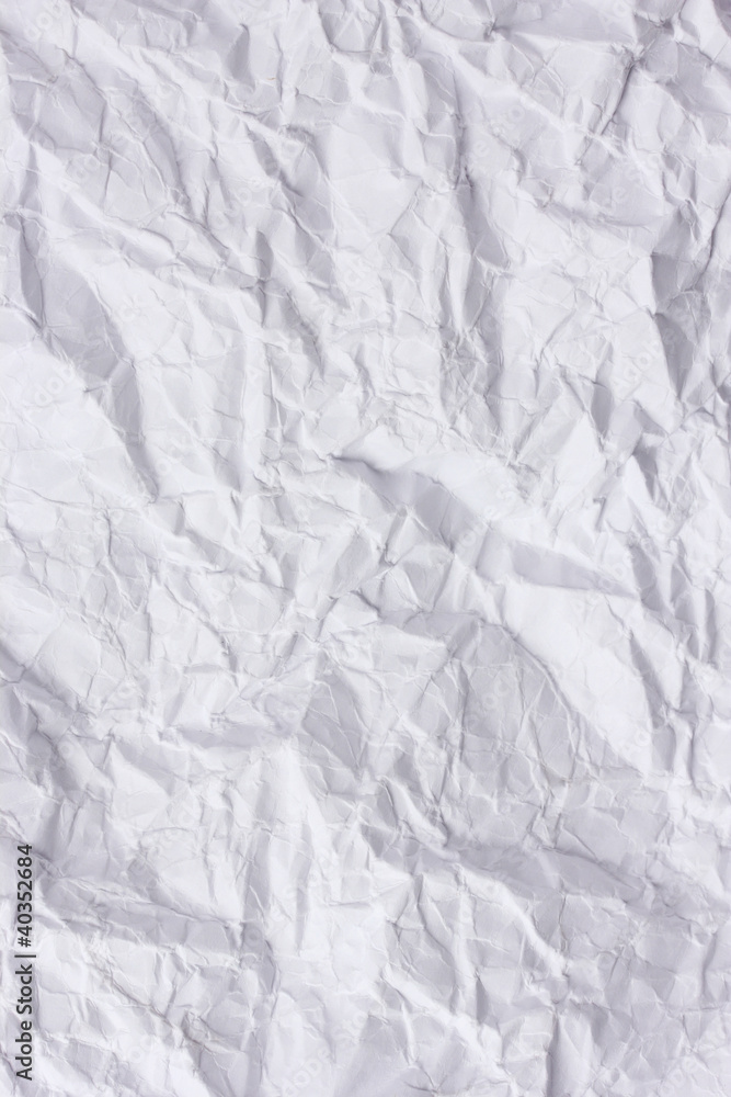 Naklejka premium White crumpled paper closeup