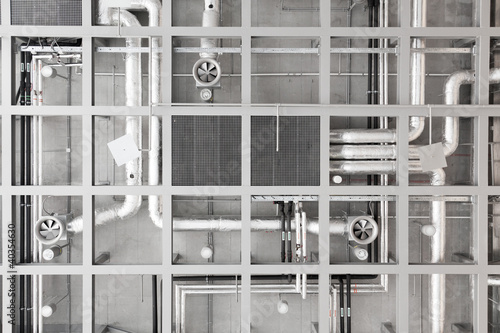 Pipes and fans on ceiling