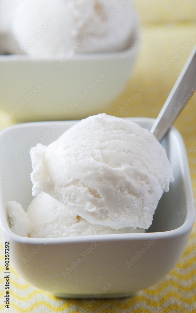 scoops of vanilla ice cream in bowl