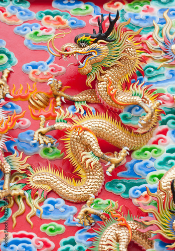 Wallpaper Mural chinese dragon statue  on temple wall in Thailand Torontodigital.ca