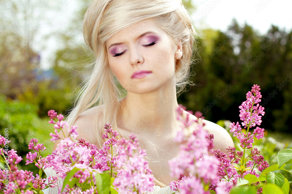 Young blond woman relaxing on nature outdoors portrait. Young blond woman relaxing on nature outdoors portrait.