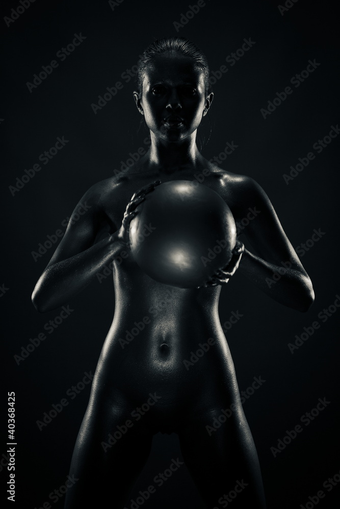 Metallic woman with ball