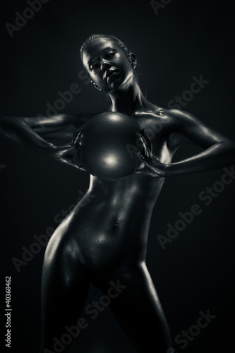 Metallic woman with ball