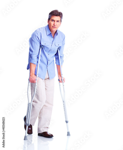 Fotografiet Man with crutch.