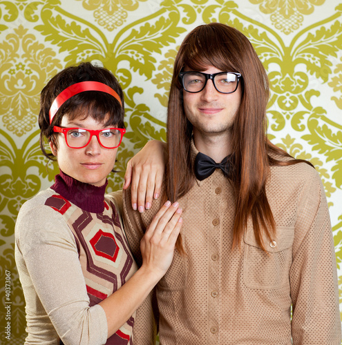 Funny humor nerd couple on vintage wallpaper photo