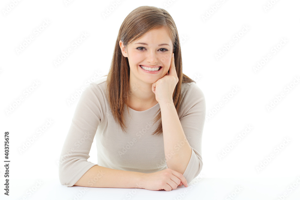 Portrait of smiling woman resting her chin on hand Portrait of smiling woman resting her chin on hand