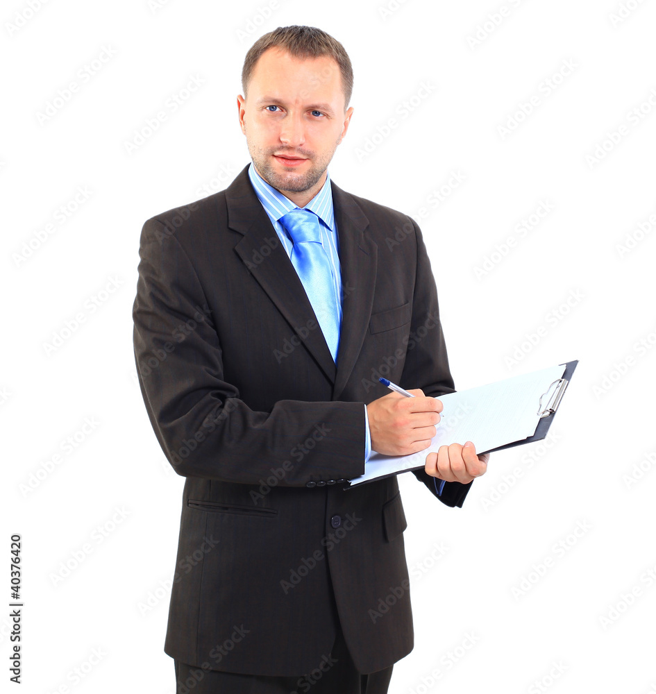 Portrait of a happy smart businessman pointing at clipboard Portrait of a happy smart businessman pointing at clipboard
