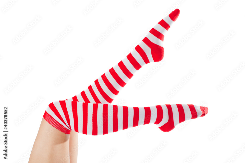 legs long female in striped socks isolated on white background legs long female in striped socks isolated on white background