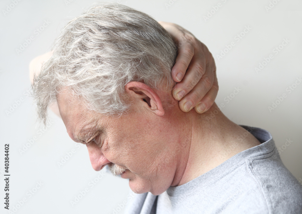 man with headache at base of skull man with headache at base of skull