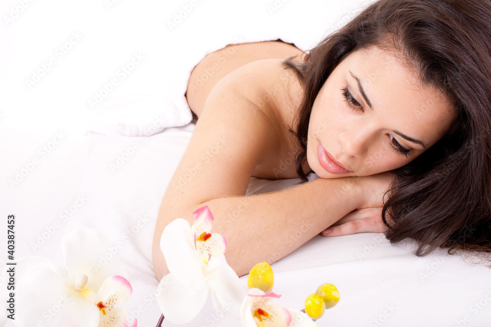 Beautiful woman in spa center on white background Beautiful woman in spa center on white background