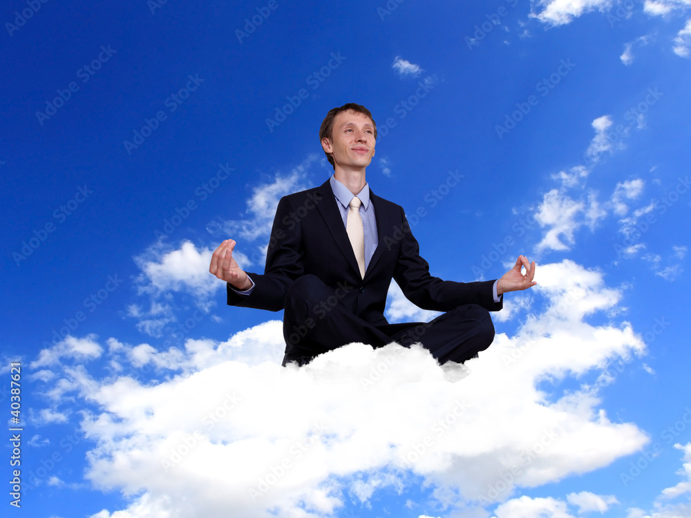 Businessman in suit praying for success Businessman in suit praying for success