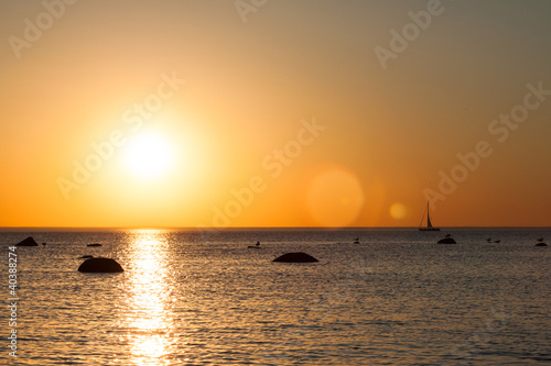 Boat and sun lens flare © romantsubin