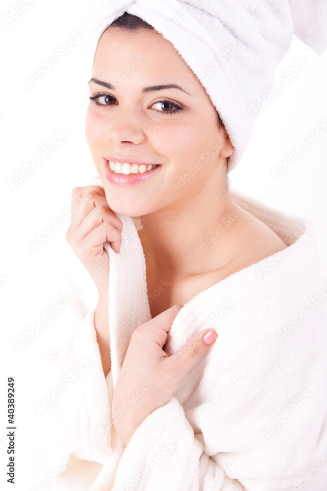 Beautiful healthy young brunette woman in a white spa bath robe Beautiful healthy young brunette woman in a white spa bath robe