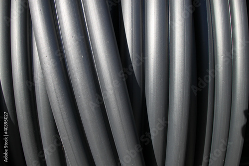 Black plastic tubes. PVC sewer pipes.