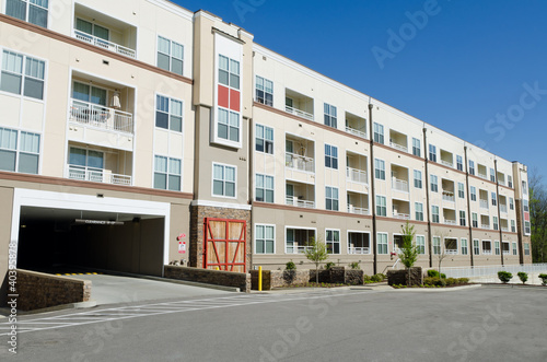 Modern apartment building with parking garage