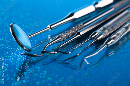 Dentist equipment on blue background