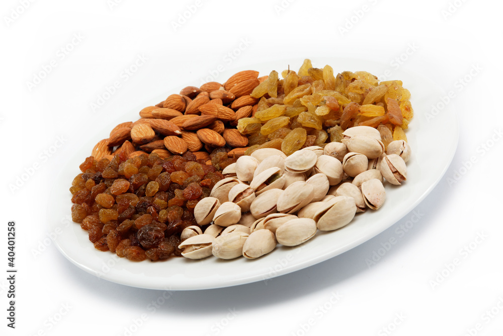 Nut-raisin mix. Almond and pistachio nuts and raisins. Nut-raisin mix. Almond and pistachio nuts and raisins.