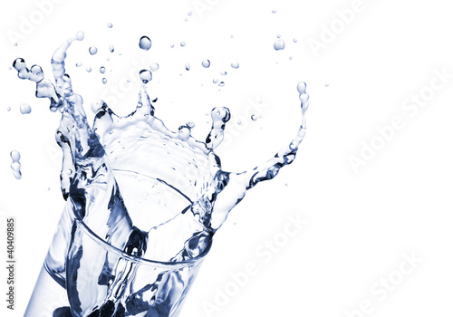 water splash in glass isolated on white