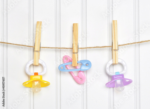 Baby Pacifier Binky Pink on a Clothesline photo