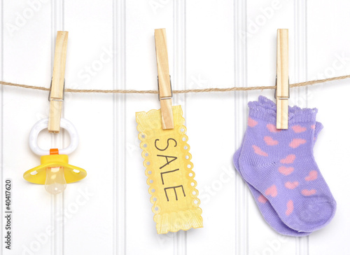 Baby Sale Goods on a Clothesline photo